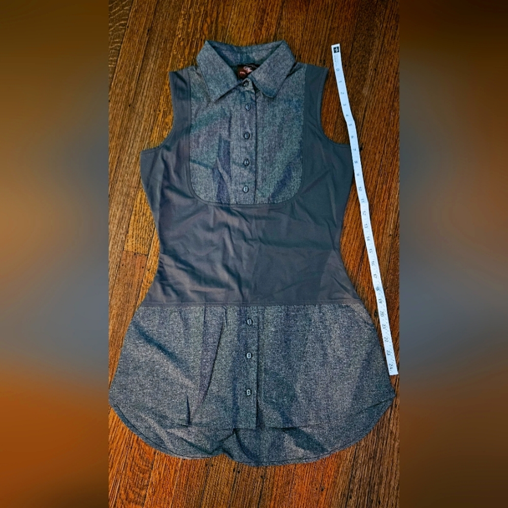 Women's Long Sleeveless Top. Asymmetrical. It features  2 different textures.